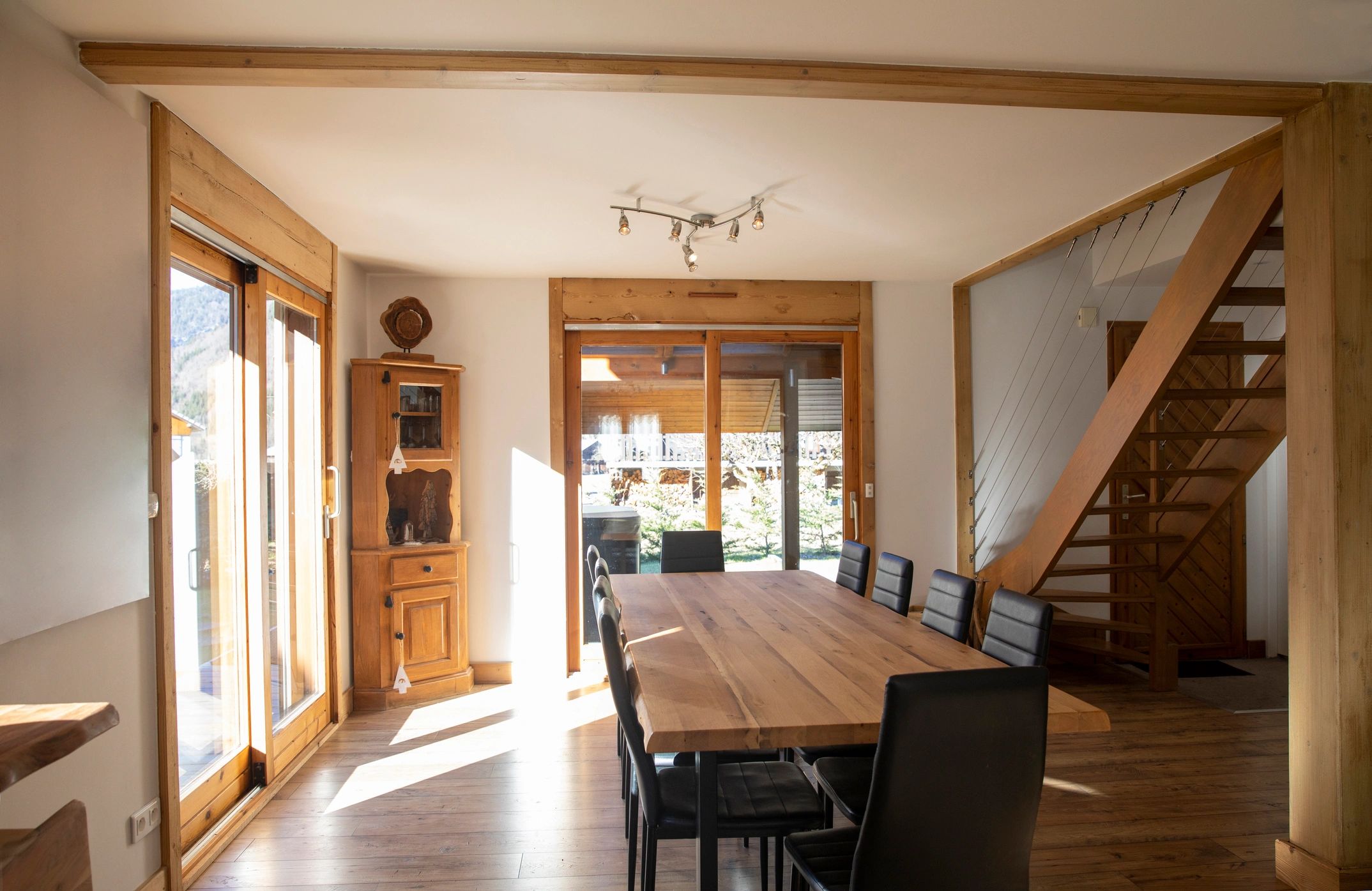 Bright staged dining area inside a home