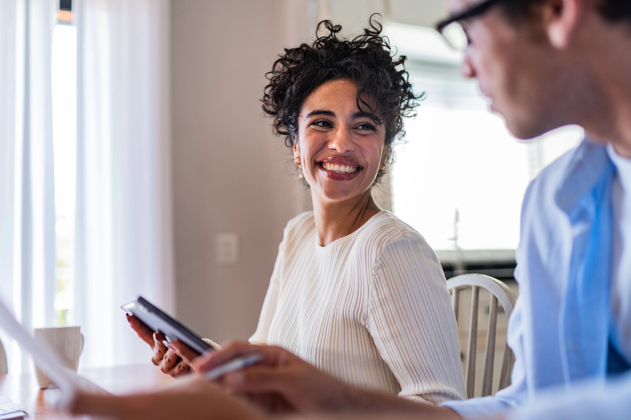 Homeowners reviewing finances together at home